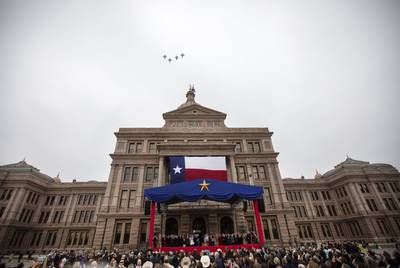 Corporations can’t donate to politicians. But $100,000 got them VIP treatment during Gov. Greg Abbott’s inauguration.